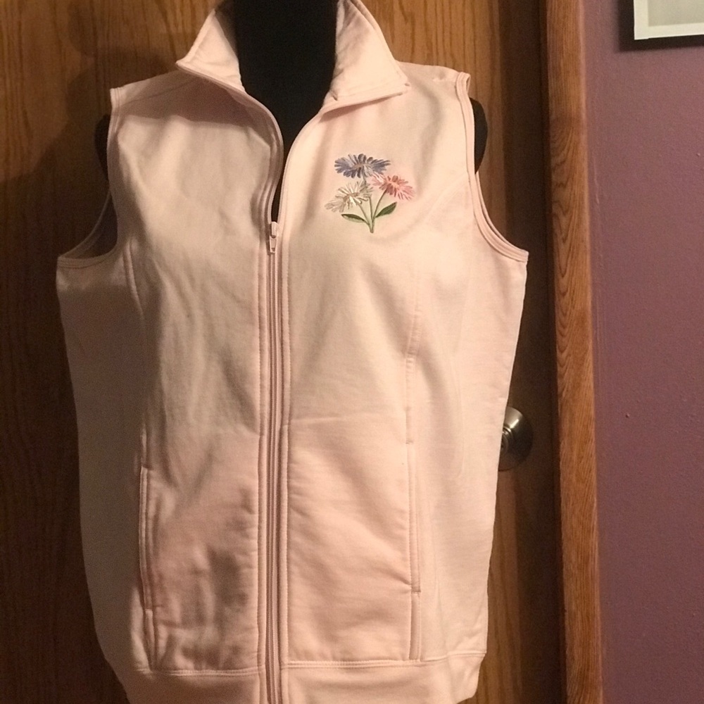 Pretty pink vest.